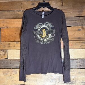 Long-sleeve T with graphic for 2012 National High School Finals Rodeo in Hawaii.